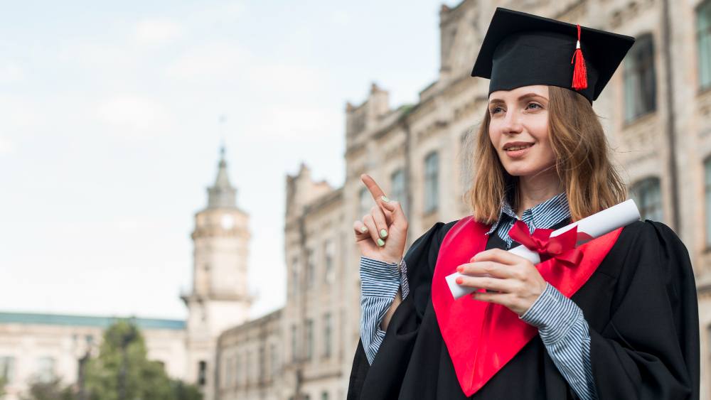 A female student in her convocation dress